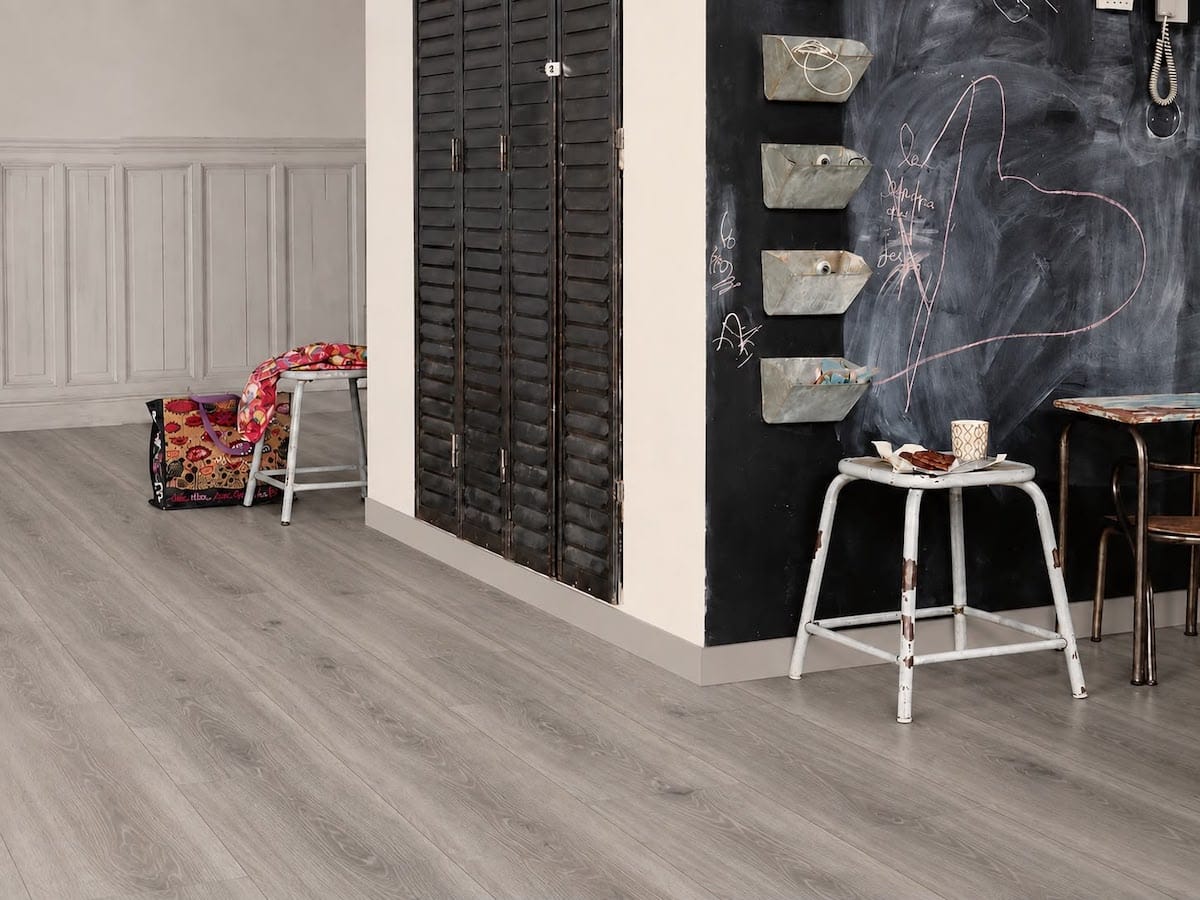 Grey SPC flooring installation in a commercial interior in Dubai