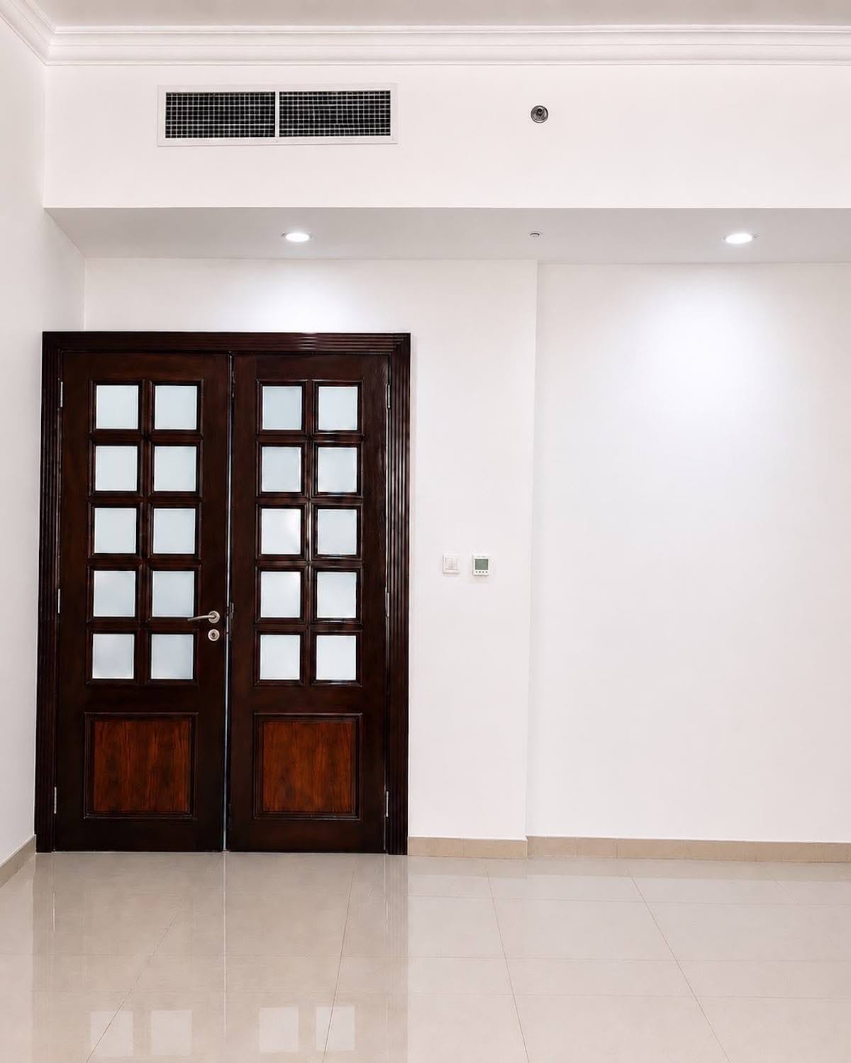Wall before marble wallpaper installation in Al Khan, Sharjah